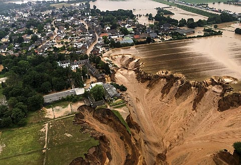 Regional authorities said several people had died after their houses collapsed due to subsidence, and aerial pictures showed what appeared to be a massive sinkhole. (Photo | AP)