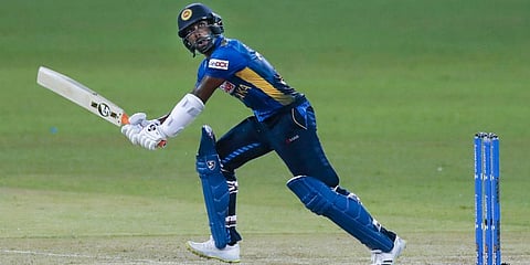 Chamika Karunaratne plays a shot during the first ODI match between Sri Lanka and India in Colombo. (Photo | AP)