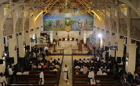 Sri Lanka's Easter Sunday attack survivors attend a holy service at the occasion of reopening of St.Anthony's church. (File Photo | AP)