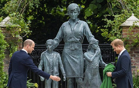 Britain's Prince William, left, and Prince Harry during the unveiling of a statue they commissioned of their mother Diana, Princess of Wales, in the Sunken Garden at Kensington Palace (Photo | AP)