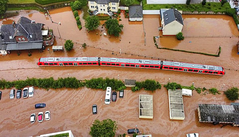 A regional train sits in the flood waters at the local station in Kordel, Germany. (File Photo | AP)