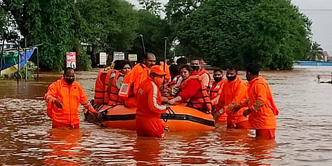 NDRF team carries out rescue and relief operations at a flood-affected area in Kolhapur. (Photo | ANI)