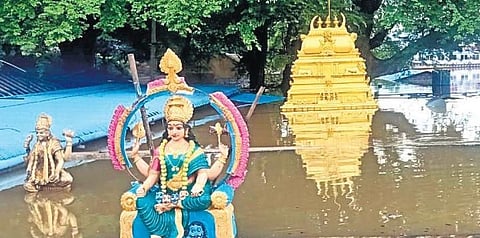 The completely submerged Gandi Pochamma temple in Devipatnam mandal of East Godavari district in Godavari floods on Saturday, July 24, 2021. (Photo | Express)