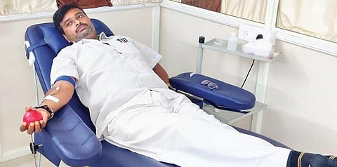 Mochi Chandrasekhar donating blood at a hospital in Anantapur. (Photo | Express)