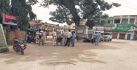 Police personnel guarding a sensitive area in Kendrapara town on Sunday | Express
