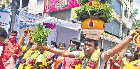People in traditional attire participate in Bonalu celebrations in Secunderabad on Sunday. (Photo | S Senbagapandiyan)