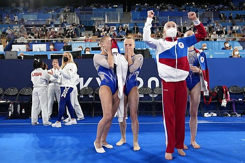 Russia's artistic gymnastics women's team, from left, Liliia Akhaimova, Angelina Melnikova, Viktoriia Listunova and Vladislava Urazova celebrate after winning the gold medal. (Photo | AP)