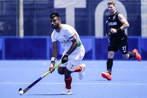 India's Manpreet Singh (7) looks to pass during a men's field hockey match against New Zealand at the 2020 Summer Olympics. (Photo | AP)