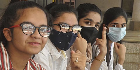 Students react after CBSE declared class 12th results, in Moradabad. (Photo| PTI)