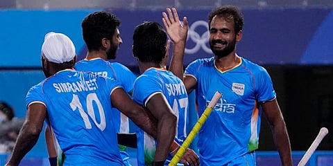 India's Gurjant Singh (9) celebrates after scoring against Japan during a men's field hockey match at the 2020 Summer Olympics in Tokyo, Japan. (Photo | AP)