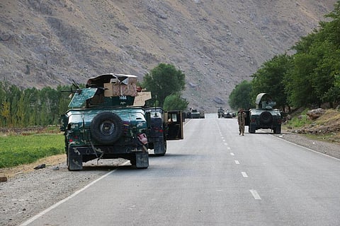 Afghan soldiers pause on a road at the front line of fighting between Taliban and Security forces, near the city of Badakhshan. (Photo | AP)