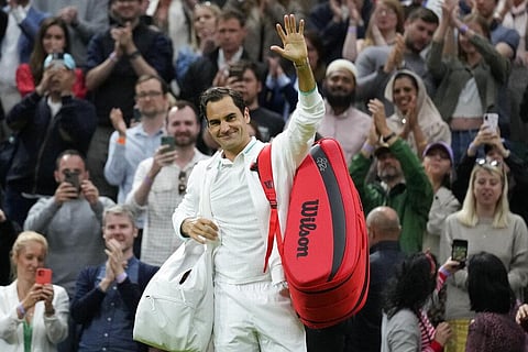 Switzerland's Roger Federer leaves the court after defeating Italy's Lorenzo Sonego during the men's singles fourth round match on day seven of the Wimbledon. (Photo | AP)