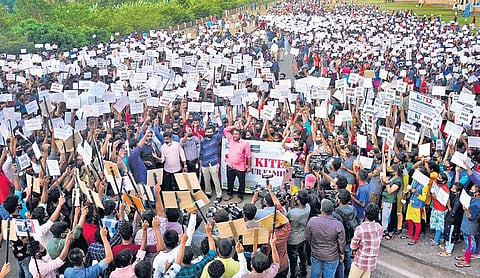 Kitex employees holding protest at the unit’s ground at Kizhakkambalam in Kochi on Monday | A Sanesh