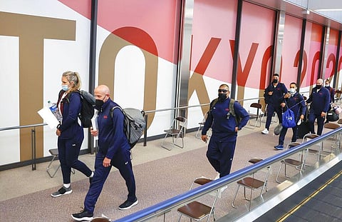 U.S. boxing team for Tokyo 2020 Olympic Games, wearing face mask, arrive at Narita international airport in Narita, east of Tokyo. (Photo | AP)