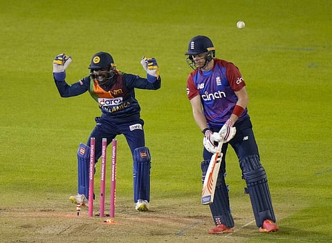 England's Sam Billings is bowled by Sri Lanka's Niroshan Dickwella during the second T20 international cricket match between England and Sri Lanka in Cardiff. (Photo | AP)