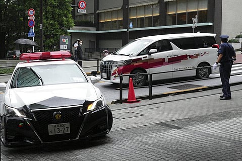A vehicle, right, which International Olympic Committee (IOC) President Thomas Bach is boarding, is escorted to an accommodation. (Photo | AP)