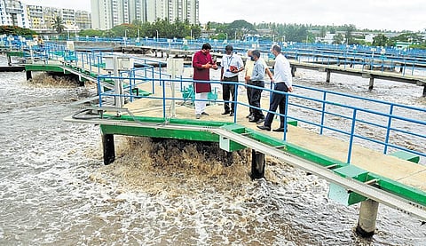 Minister for Environment and Tourism C P Yogeeshwara inspects the Vrishabhavathi valley STP at Nayandahalli and Byramangala Lake on Thursday | Express