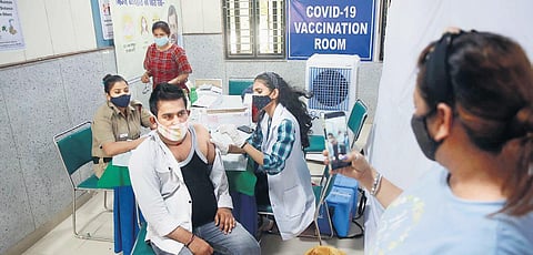 A beneficiary gets Covid-19 vaccination. (File photo | Shekhar Yadav, EPS)