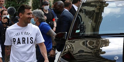 Argentinian star Lionel Messi smiles as he arrives at his hotel in Paris. (Photo | AP)