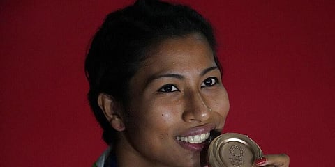 India's Lovlina Borgohain, a bronze medalist, after the women's welterweight 69-kg medal ceremony at the 2020 Summer Olympics. (Photo | AP)