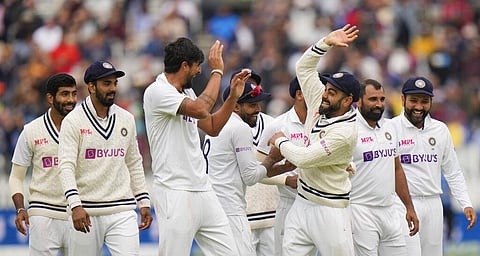 India's Virat Kohli, centre right and India's Ishant Sharma, centre left, reacts after the video review of India's Ishant Sharma's appeal for lbw on England's Jonny Bairstow. (Photo | AP)