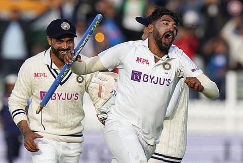 India's Mohammed Siraj, right, celebrates after taking the wicket clean bowled of England's James Anderson. (Photo | AP)