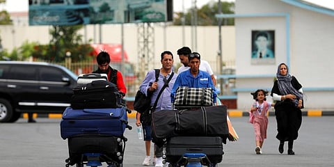 Passengers walk to the departures terminal of Hamid Karzai International Airport in Kabul, Afghanistan. Image used for representational purpose. (Photo | AP)
