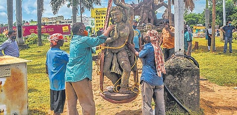 Workers shifting an idol near warrior-horse replica at Master Canteen Square | Express