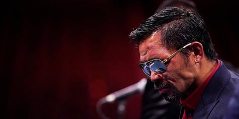 Manny Pacquiao, of the Philippines, attends a news conference after his loss to Yordenis Ugas, of Cuba, in a welterweight championship boxing match in Las Vegas. (Photo | AP)