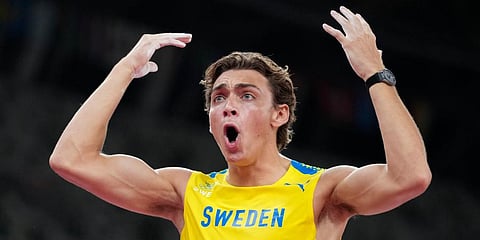 Armand Duplantis, of Sweden, celebrates after winning the gold medal in the men's pole vault final at the 2020 Summer Olympics in Tokyo. (Photo | AP)