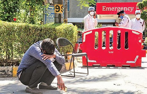 Relative of a patient at Delhi’s Jaipur Golden Hospital, where 21 Covid-19 patients died on the intervening night of April 23 and 24. (File Photo | PTI)