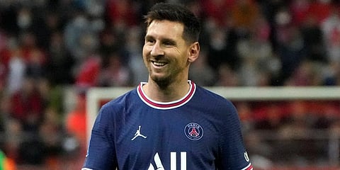 PSG striker Lionel Messi smiles during the France League One soccer match between Reims and Paris Saint-Germain, at the Stade Auguste-Delaune in Reims. (Photo | AP)
