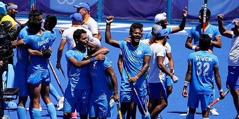 Indian players celebrate after defeating Germany 5-4 during the men's field hockey bronze medal match at the 2020 Summer Olympics in Tokyo, Japan. (Photo | AP)