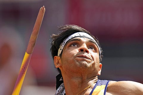 Neeraj Chopra, of India, competes in the qualification round of the men's javelin throw at the 2020 Summer Olympics. (Photo |AP)