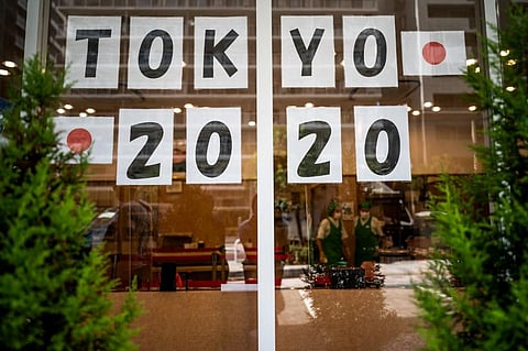 A sign is displayed at a hotel in Tokyo on July 21, 2021, ahead of the Tokyo 2020 Olympic games. (Photo | AFP)