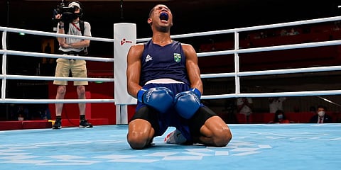 Brazil's Hebert Sousa celebrates after his men's middleweight 75-kg boxing gold medal match against Ukraine's Oleksandr Khyzhniak at the 2020 Summer Olympics in Tokyo, Japan. (Photo | AP)