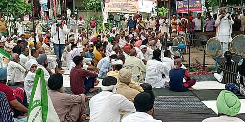 Farmers in Karnal during their sit-in protest demanding action against IAS officer Ayush Sinha. (Photo | ANI)