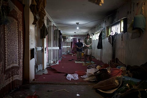 Recently arrested prisoners pray inside the Pul-e-Charkhi prison in Kabul, Afghanistan, Monday, Sept. 13, 2021. (Photo | AP)