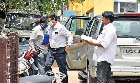 FILE - Fibernet scam accused K Sambasiva Rao arrives for questioning at CID office in Vijayawada.