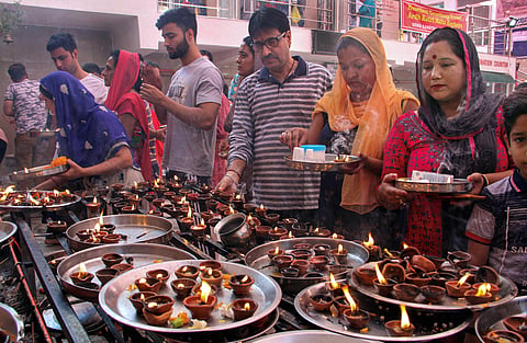 Kashmiri Pandits offer prayers at the replica of Kheer Bhawani temple. (Photo| PTI)
