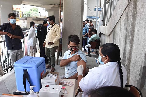 Citizens take covid vaccine during special vaccination drive in Vijayawada on Friday. (Photo | Prasant Madugula, EPS)