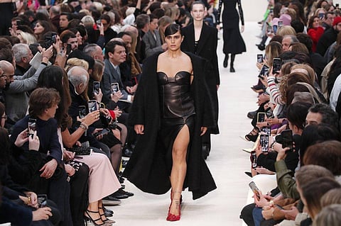 In this March 1, 2020 file photo, a model wears a creation for the Valentino fashion collection during Women's fashion week Fall/Winter 2020/21 presented in Paris. (File photo | AP)
