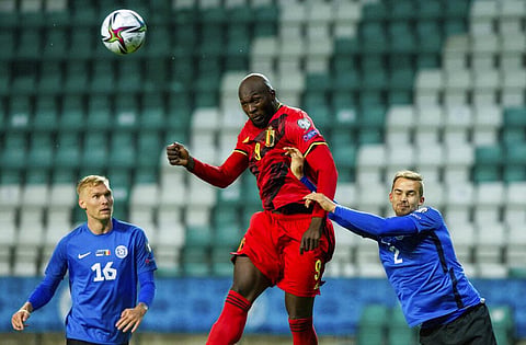 Belgium's Romelu Lukaku, centre, fights for the ball with Estonia players during World Cup 2022 qualifying at the A. Le Coq Arena in Tallinn, Estonia, Thursday. (Photo | AP)