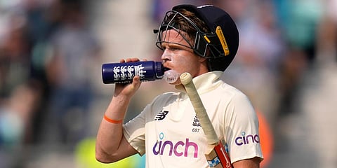 England's Ollie Pope during a drinks break on day two of the fourth Test match at The Oval cricket ground in London. (Photo | AP)