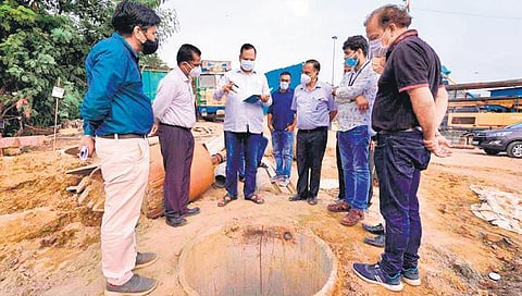Water Minister Satyendar Jain inspecting the works of a water extraction well