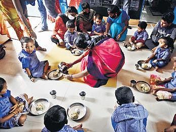 File photo of children eating a mid-day meal in Chennai (Photo | Express)