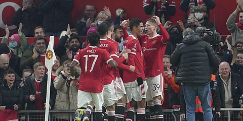 Manchester United's Scott McTominay, right, jubilates with teammates after scoring the opening goal during the English FA Cup third round soccer match against Aston Villa (Photo | AP)