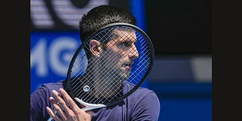 Defending men's champion Serbia's Novak Djokovic practices on Rod Laver Arena ahead of the Australian Open tennis championship in Melbourne, Australia, Wednesday, Jan. 12, 2022.(Photo | AP)