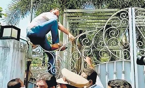 A Crime Branch official scales the locked gate of actor Dileep’s compound | Express