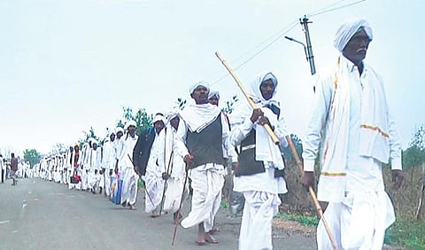The Mesram clan members, who perform rituals to the deity during Nagoba Jatara, carry Godavari water from Kalamadugu village in Mancherial